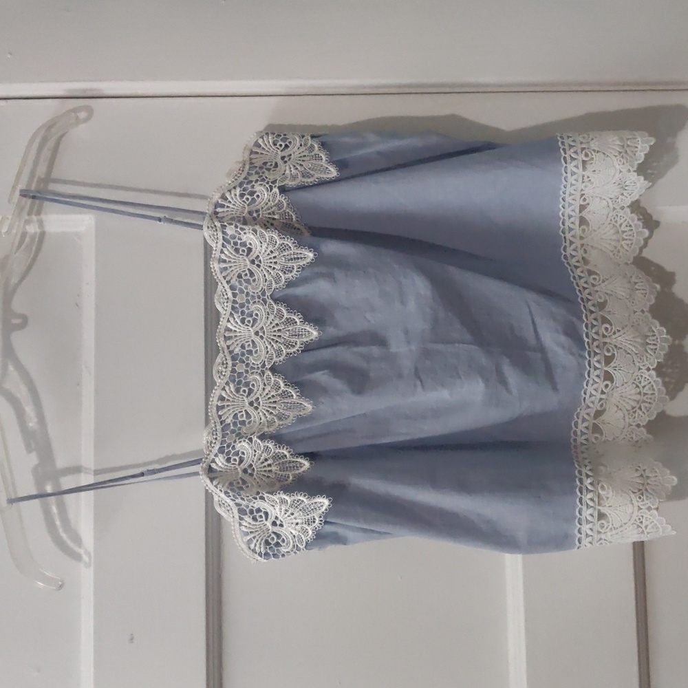 Express floral tank top with thin spaghetti straps and white lace detail